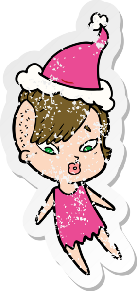 Bir insan tarafından çizilmiş Noel Baba şapkası giymiş şaşırmış bir kızın el yazısı.