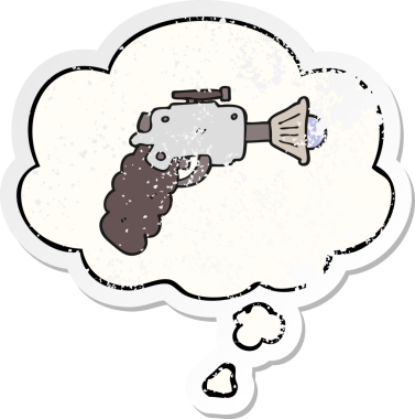 Düşünce baloncuklu karikatür ışın tabancası insan tarafından çizilmiş yıpranmış bir çıkartma gibi.