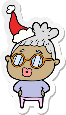 Kütüphaneci bir kadının el yazısı. Gözlük takıyor. Noel Baba şapkası takıyor.