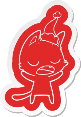 Konuşan kedi çizgi filmi çıkartması Noel Baba şapkası giyen bir insan tarafından çizilmiş.