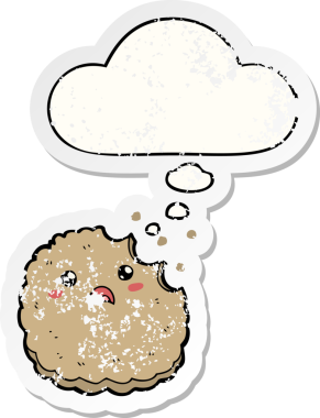 Düşünce baloncuklu çizgi film bisküvisi insan tarafından çizilmiş yıpranmış bir çıkartma.