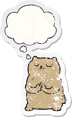 Düşünce baloncuğu olan çizgi film ayısı bir insan tarafından çizilmiş yıpranmış bir çıkartma.