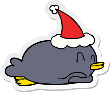 Penguen göbeğinde bir insan tarafından çizilmiş Noel Baba şapkası var.