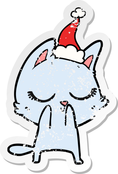 Sakin bir el, kederli bir insan tarafından çizilmiş Noel Baba şapkası takan bir kedinin çıkartması.