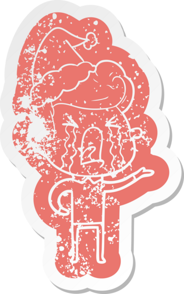 Bir insan tarafından çizilmiş Noel Baba şapkası takan ağlayan bir adamın garip karikatürü.