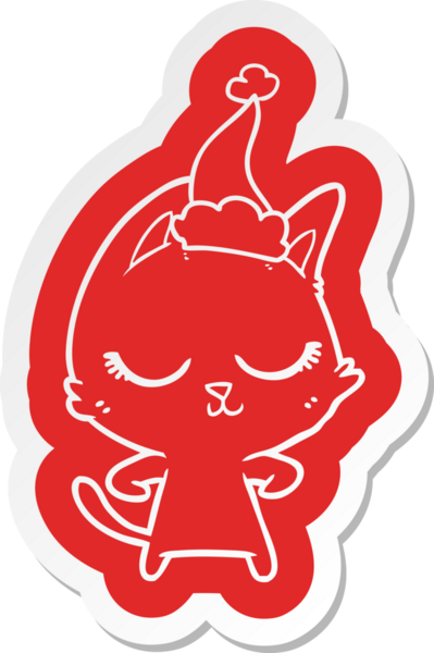 Bir insan tarafından çizilmiş Noel Baba şapkası takan bir kedinin garip çizgi film çıkartması.