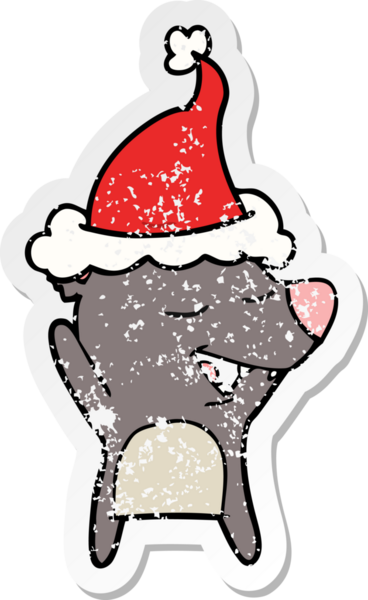 Bir insan tarafından çizilmiş Noel Baba şapkası takan bir ayının çizilmiş el yazısı.