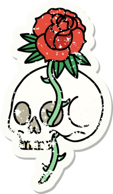 Geleneksel bir kafatası stili ve bir insan tarafından çizilmiş gül dövmesi.