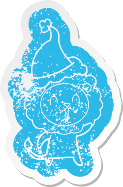 Gülen aslan çizgi filmi, bir insan tarafından çizilmiş Noel Baba şapkasının çıkartması.