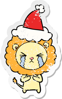 Bir insan tarafından çizilmiş Noel Baba şapkası giymiş ağlayan bir aslanın el yazısı.