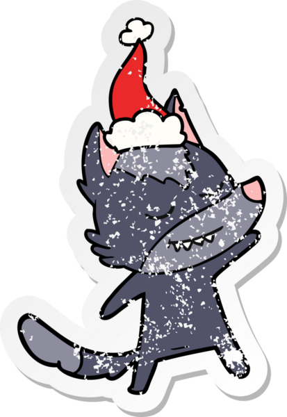 Dost canlısı el, bir insan tarafından çizilmiş Noel Baba şapkası takan bir kurt çıkartması çizmiş.