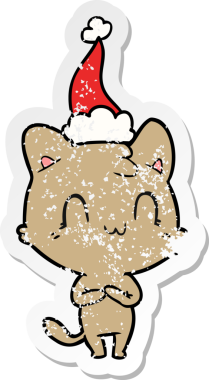 Bir insan tarafından çizilmiş Noel Baba şapkası takan mutlu bir kedinin çizilmiş el yazısı.