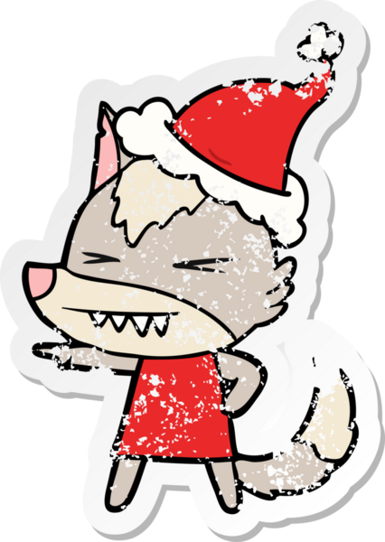 Kızgın kurt eli, bir insan tarafından çizilmiş Noel Baba şapkasının üzgün çıkartmasını çizmiş.