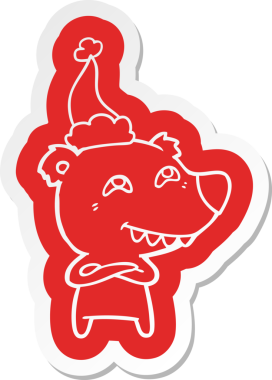 Bir insan tarafından çizilmiş Noel Baba şapkası takan bir ayının garip çizgi film etiketi.