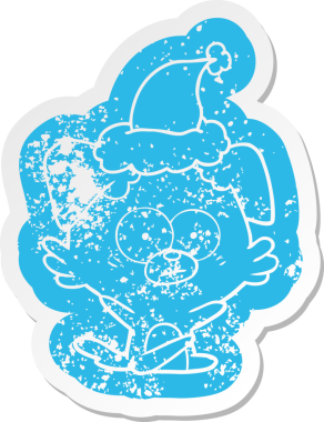 Sinirli köpek çizgi filmi, bir insan tarafından çizilmiş Noel Baba şapkasının çıkartması.