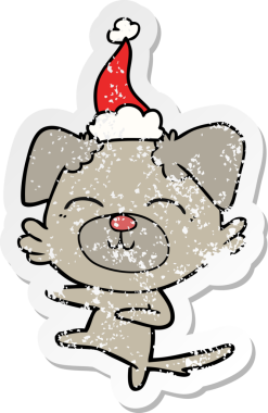 Bir insan tarafından çizilmiş Noel Baba şapkası giymiş bir köpeğin tekmelendiği el yazısı.