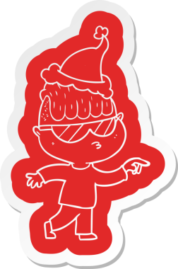 Güneş gözlüğü takan, Noel Baba şapkası takan bir çocuğun insan tarafından çizilmiş garip bir karikatür çıkartması.