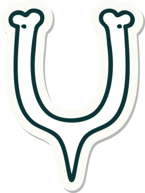 Bir insan tarafından çizilmiş bir dilek kemiğinin geleneksel stiliyle dövme çıkartması.