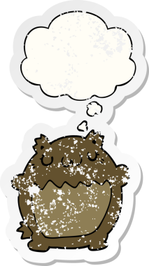 Düşünce baloncuğu olan çizgi film ayısı bir insan tarafından çizilmiş yıpranmış bir çıkartma.