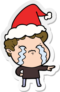 Bir insan tarafından çizilmiş Noel Baba şapkasıyla ağlayan bir adamın el yazısı.