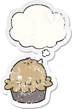 Düşünce baloncuğu olan şirin bir çizgi film pastası bir insan tarafından çizilmiş yıpranmış bir çıkartma gibi.