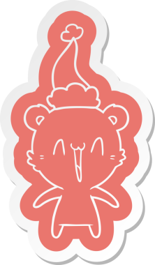 Mutlu kutup ayısı garip çizgi film çıkartması. Bir insan tarafından çizilmiş Noel Baba şapkası.