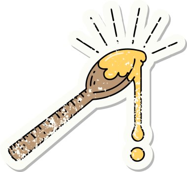 Bir insan tarafından çizilmiş bir kaşık dolusu bala ait eski bir dövme çıkartması.