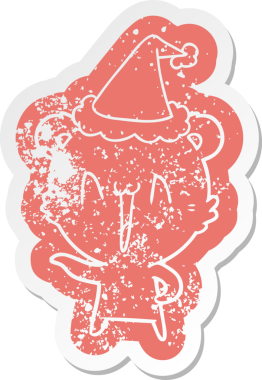 Gülen kutup ayısı çizgi filmi, bir insan tarafından çizilmiş Noel Baba şapkasının çıkartması.