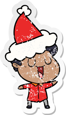 Gülen el, bir insan tarafından çizilmiş Noel Baba şapkası giymiş bir adamın kederli çıkartmasını çizdi.