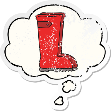 Çizmeli Wellington çizmeleri. Düşünce baloncuğu insan tarafından çizilmiş, yıpranmış bir çıkartma.