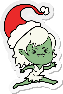 Bir insan tarafından çizilmiş Noel Baba şapkası takan vampir bir kızın çizilmiş el yazısı.