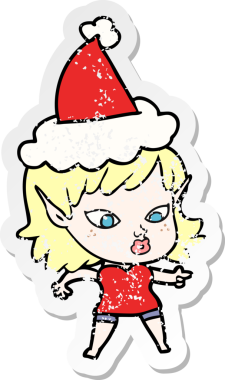 Bir insan tarafından çizilmiş Noel Baba şapkası takan bir elf kızı çizilmiş güzel bir el yazısı.