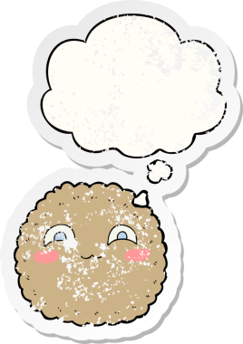 Düşünce baloncuklu çizgi film bisküvisi insan tarafından çizilmiş yıpranmış bir çıkartma.