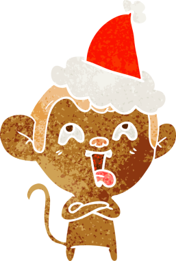 Çılgın el, insan tarafından çizilmiş Noel Baba şapkası takan bir maymunun eski çizgi filmini çizdi.