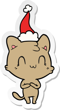 Bir insan tarafından çizilmiş Noel Baba şapkası takan mutlu bir kedinin el yazısı.