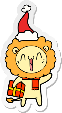 Bir insan tarafından çizilmiş Noel Baba şapkası giymiş bir aslanın mutlu el çizimi karikatürü.