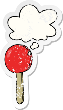 Düşünce baloncuklu çizgi film lolipopu insan tarafından çizilmiş yıpranmış bir çıkartma.