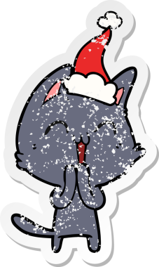 Mutlu el çizilmiş hüzünlü bir karikatür. Bir insan tarafından çizilmiş Noel Baba şapkası takan bir kedi.