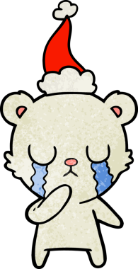 Ağlayan kutup ayısı eli bir insan tarafından çizilmiş Noel Baba şapkası.