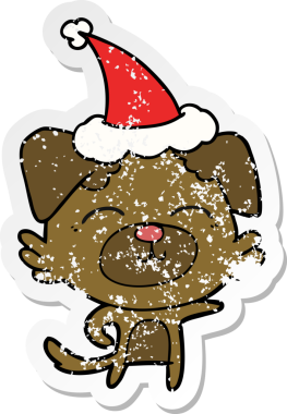 Bir insan tarafından çizilmiş Noel Baba şapkası takan bir köpeğin çizilmiş dertli çıkartması.