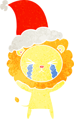Bir insan tarafından çizilmiş Noel Baba şapkası takan ağlayan bir aslanın eski çizgi filmi.