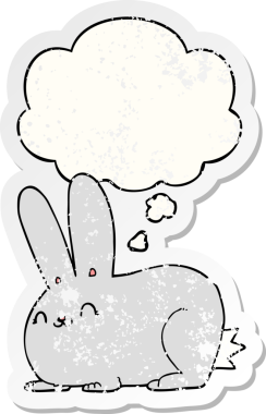Düşünce baloncuğu olan çizgi film tavşanı insan tarafından çizilmiş yıpranmış bir çıkartma.