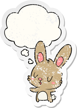 Düşünce baloncuğu olan sevimli çizgi film tavşanı bir insan tarafından çizilmiş yıpranmış bir çıkartma.