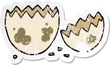 Bir insan tarafından çizilmiş yumurta kırılan karikatür çıkartması.