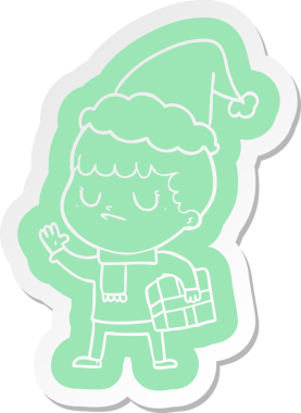 Bir insan tarafından çizilmiş Noel Baba şapkası giyen huysuz bir çocuğun garip çizgi film etiketi.