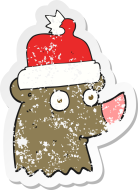 Bir insan tarafından çizilmiş noel şapkası giyen bir ayının gerilemiş çıkartması.