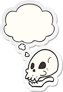 İnsan tarafından çizilmiş bir çıkartma olarak düşünce baloncuğu olan karikatür kafatası.