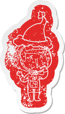 Gülen karikatür, Noel Baba şapkası takan astronotun sıkıntılı çıkartması.