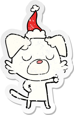 Bir insan tarafından çizilmiş Noel Baba şapkası takan bir köpeğin el yazısı.