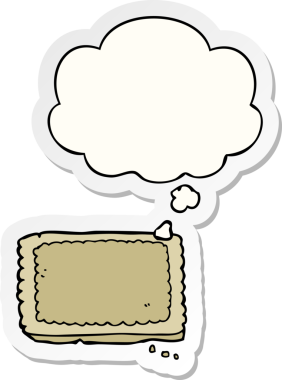 Düşünce baloncuklu çizgi film bisküvisi insan tarafından çizilmiş bir çıkartma.